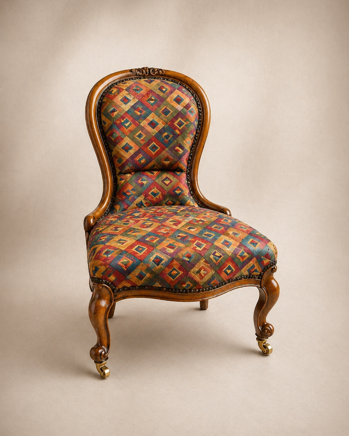Victorian spoon-back chair in geometric harlequin print